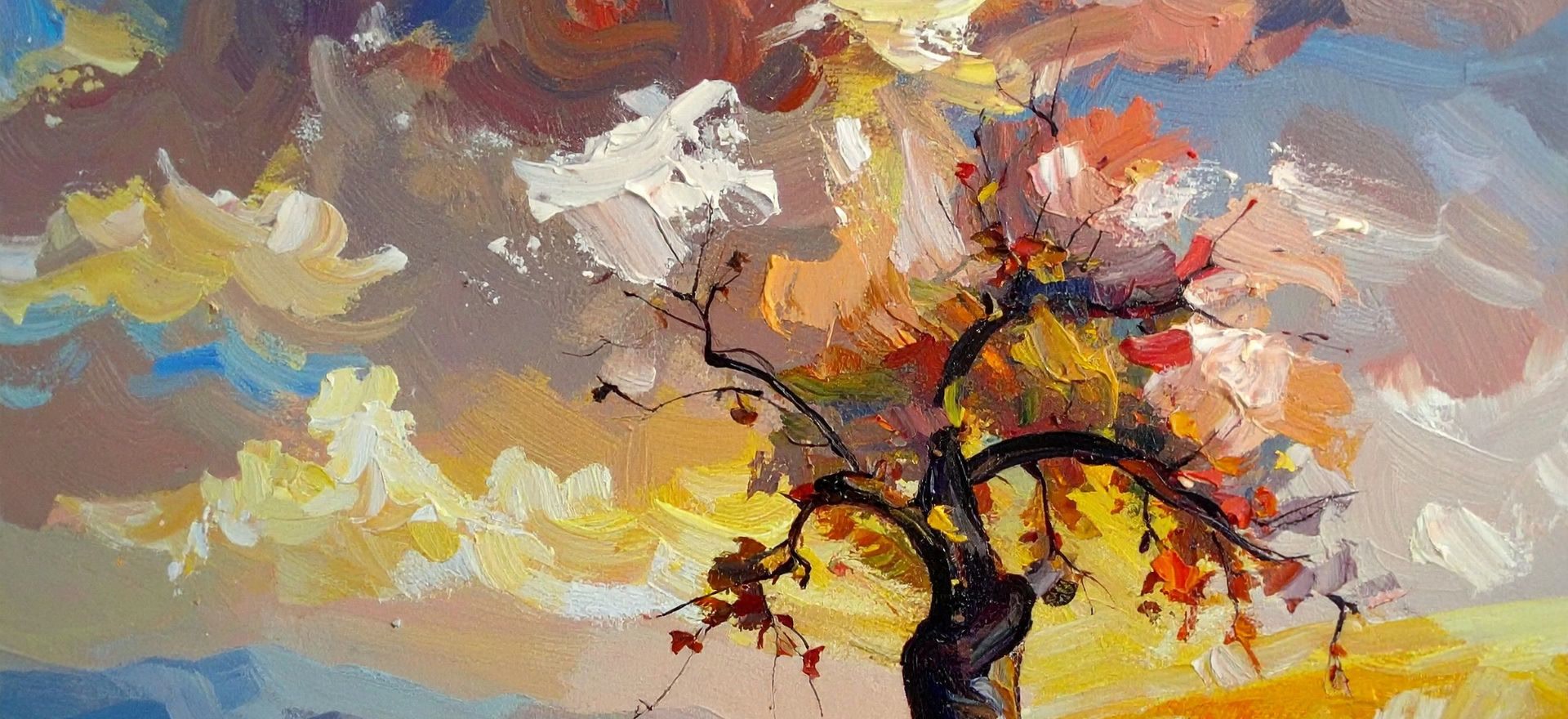 Detalle de una pintura al óleo con pinceladas de empaste mostrando un árbol otoñal y un cielo cálido